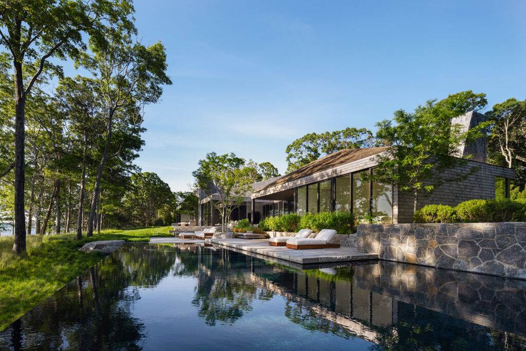 The Bay House, a shingled waterfront home with infinity-edge pool on the East End